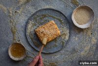 Honey-Baked Feta with Sesame Crust and Warm Herbs