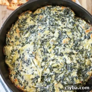 Ever wonder how to make spinach artichoke dip perfectly creamy? Try this perfect baked, hot spinach artichoke dip.