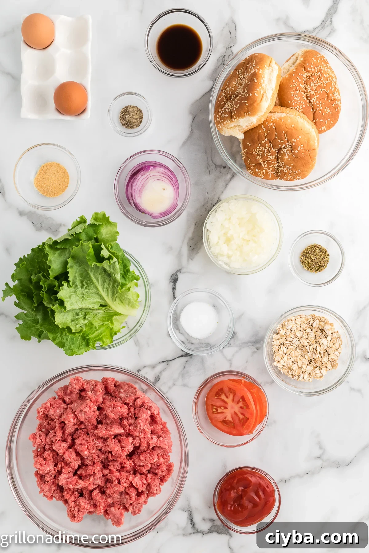 Ingredients needed - beef, oats, eggs, onion, worcestershire sauce, ketchup, oregano, garlic powder, salt and pepper, avocado oil, buns, lettuce, tomato, red onion