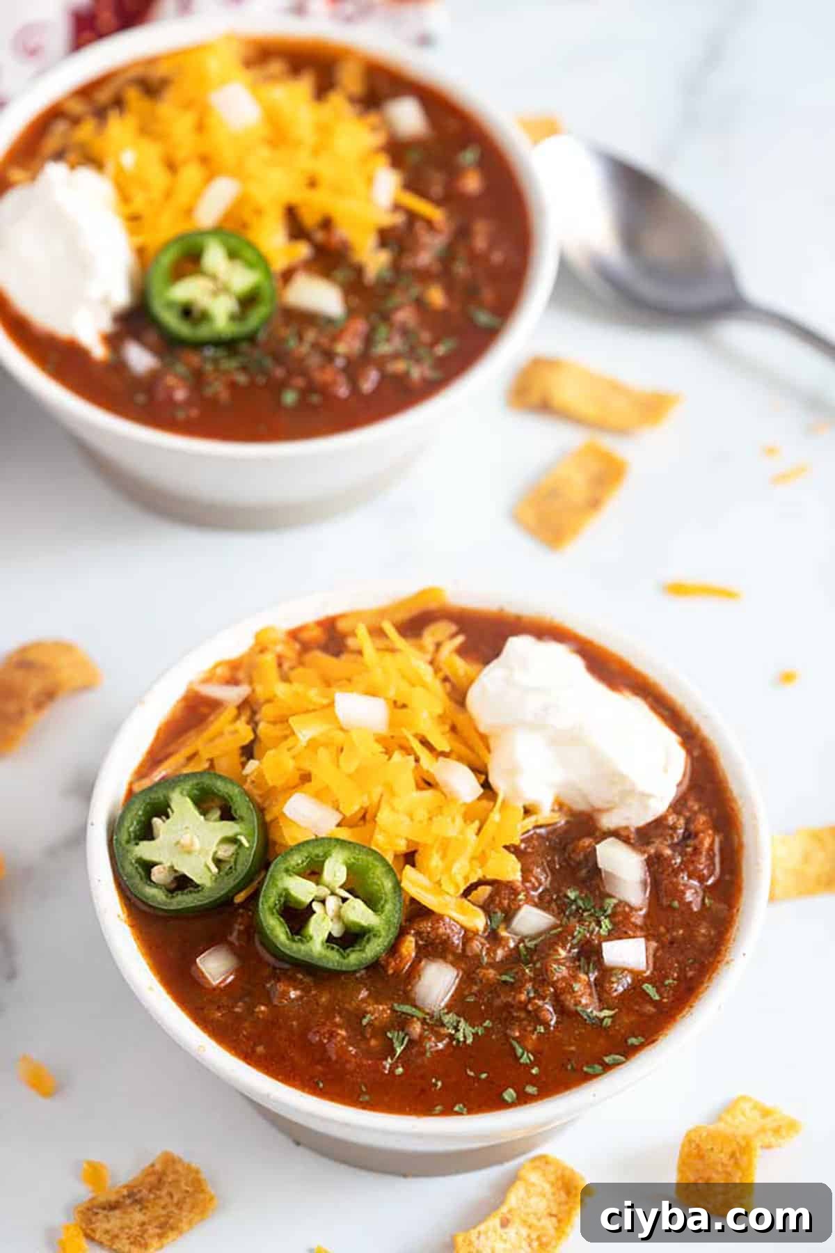 Instant Pot Texas Chili Recipe — Ready in 30 Minutes 2 A bowl of Instant Pot Chili with all the toppings.