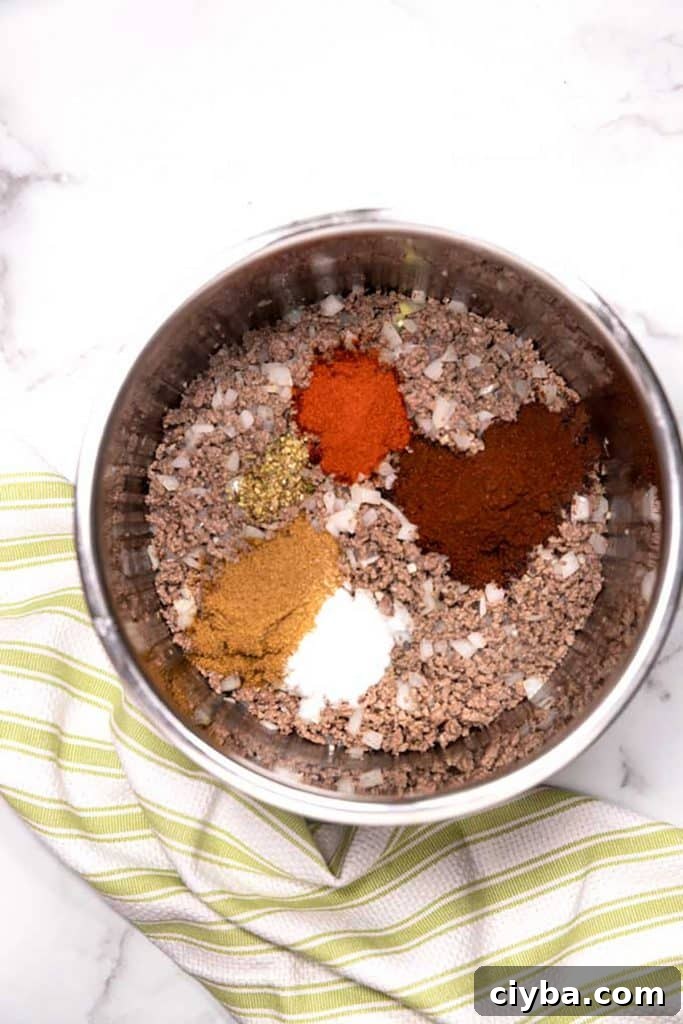 Instant Pot Texas Chili Recipe — Ready in 30 Minutes 7 cooked ground beef with all the spices