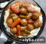 Easy Dinner recipe from The Lazy Dish | Frozen Meatball Pot Roast made in a slow cooker with just a few budget ingredients.