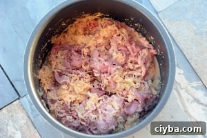 Slow Cooker Reuben Sandwiches from Zestuous
