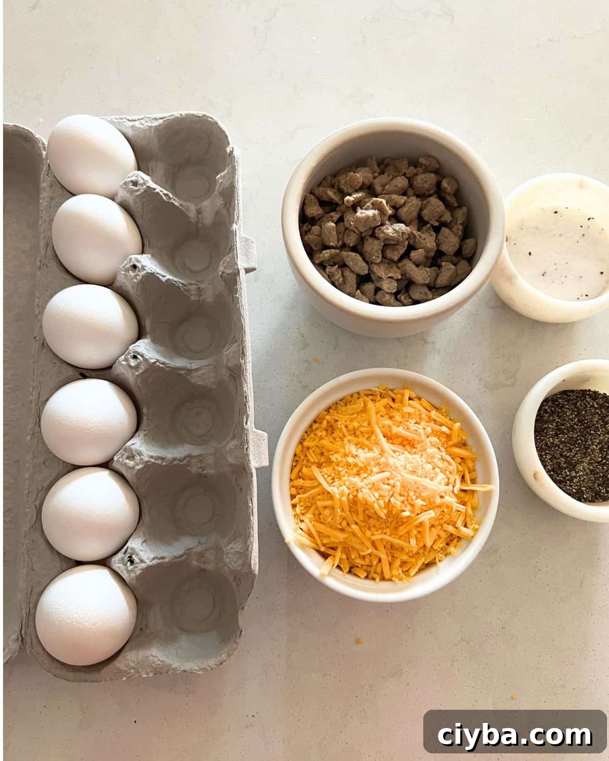 Ingredients needed for Egg and Sausage Muffins. 