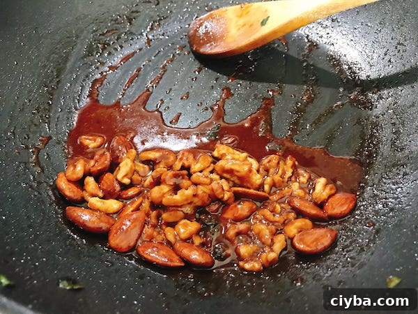 Sautéed Swiss Chard with Chickpea Miso Butter Recipe 11 Add walnuts and almonds to the sauce