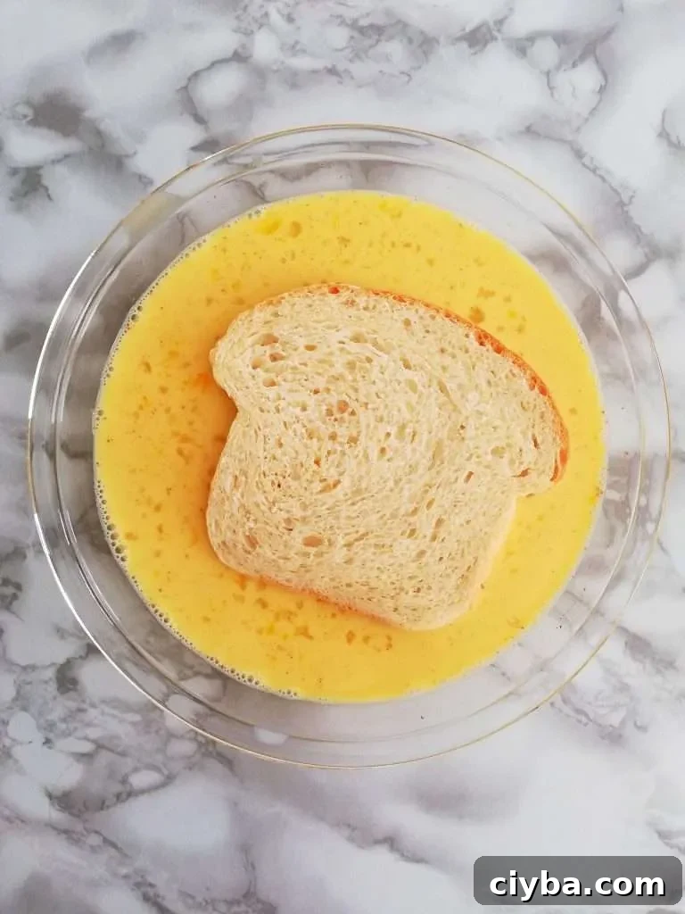 French toast recipe toast in egg and milk mixture