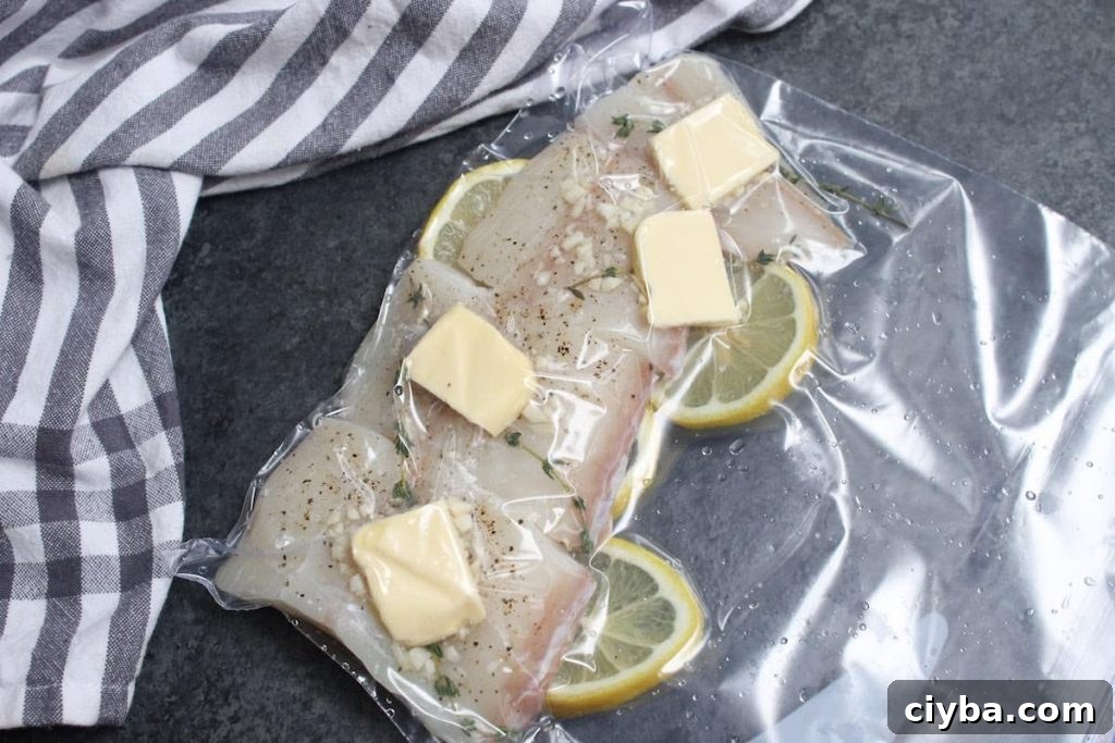 Seasoned halibut filet vacuum-sealed in a zip-lock bag.