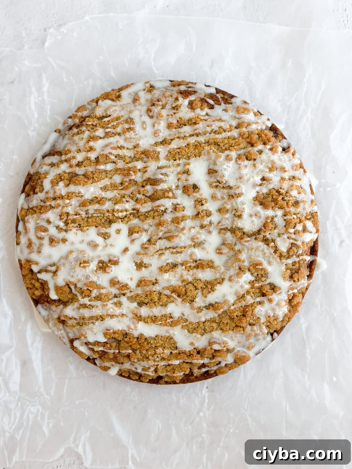 carrot cake coffee cake after drizzled with vanilla glaze, ready to serve.