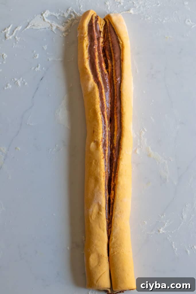 pumpkin babka dough rolled and sliced