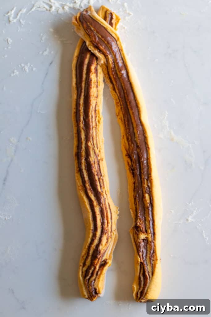 pumpkin nutella babka dough rolled and sliced down middle