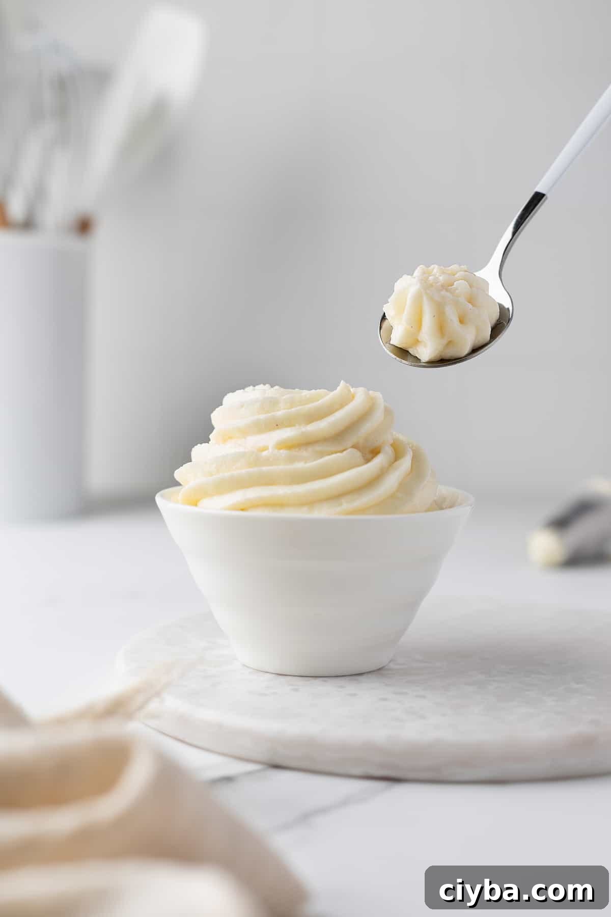 Diplomat Cream Recipe: Smooth Creme Diplomate for Pastries 3 Piped Diplomat cream in a bowl and over a spoon