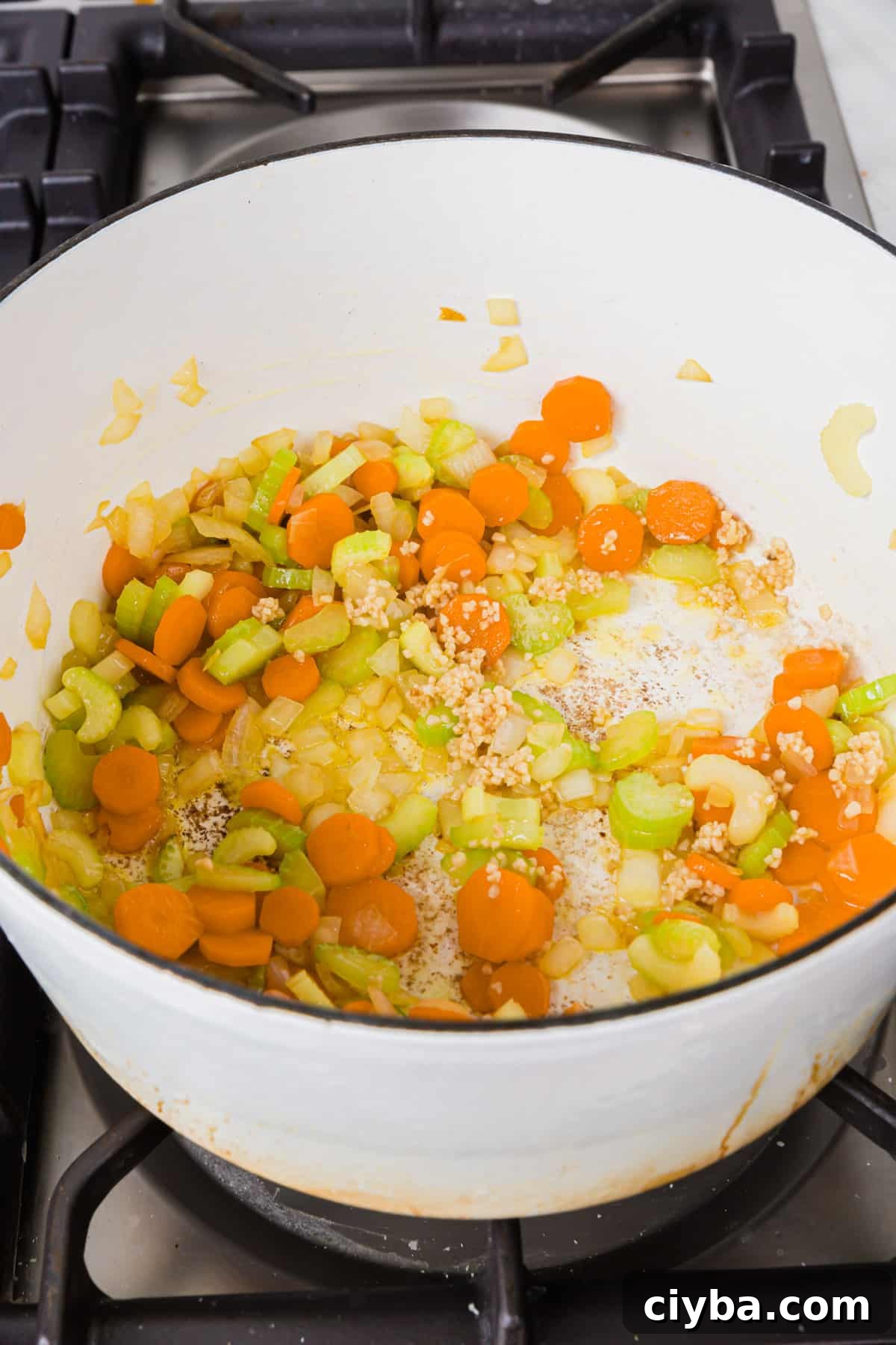 A white dutch over of diced celery, carrots, onion and minced garlic sautéed in olive oil.