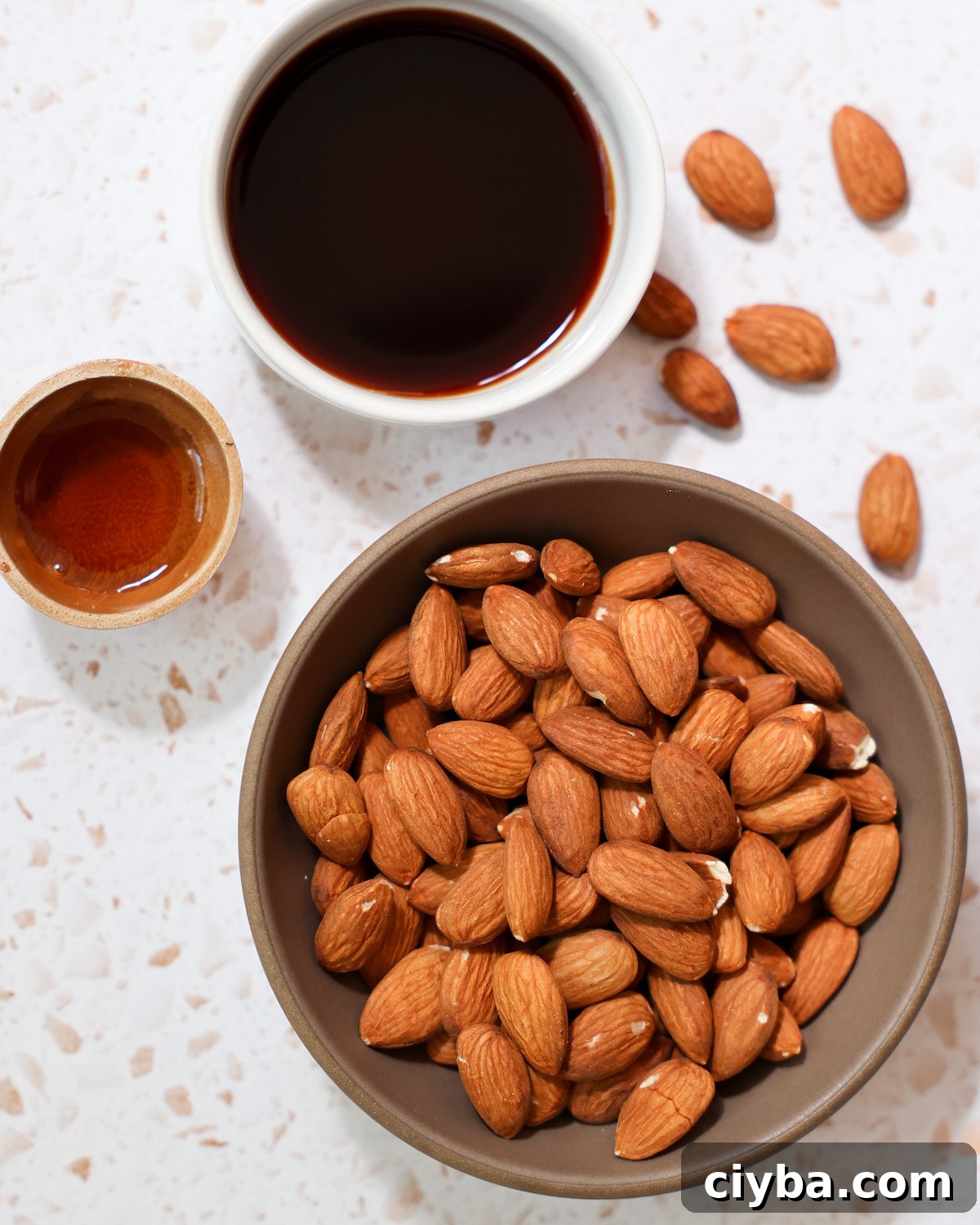An overhead shot of all of the ingredients for roasted tamari almonds.
