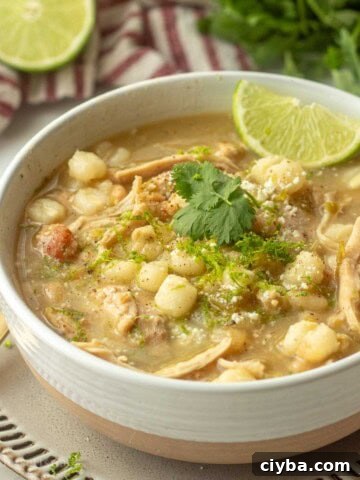 Bowl of green posole in bowl.