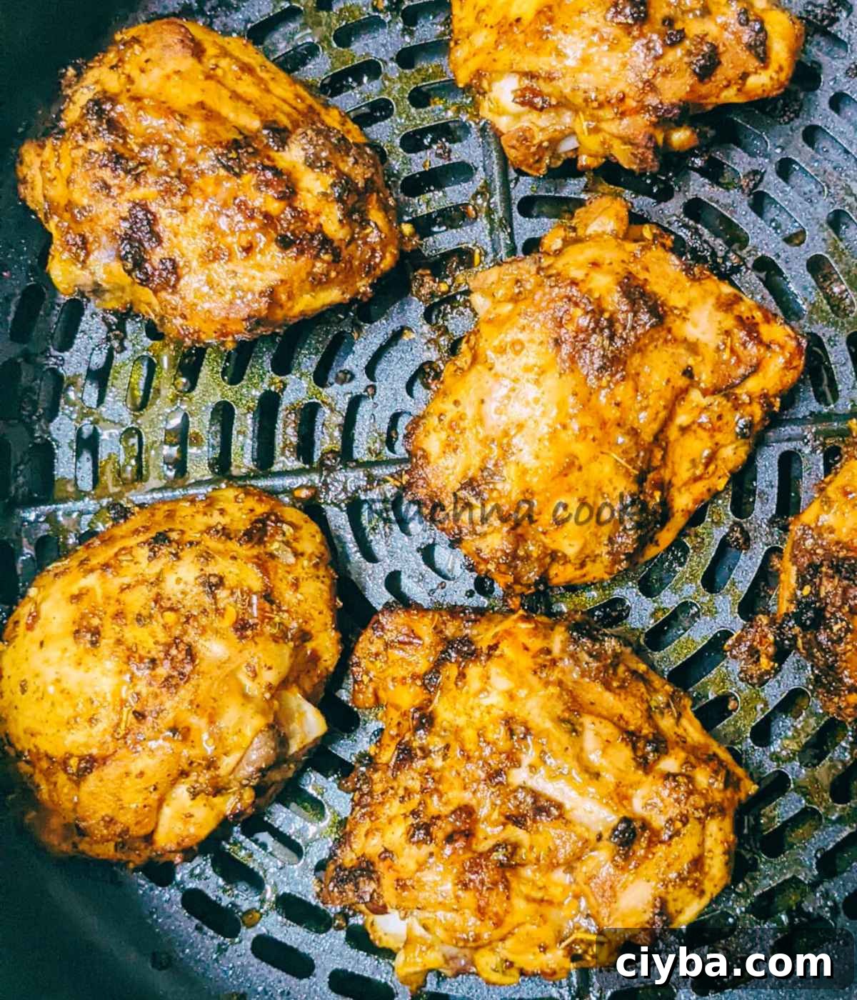 Gorgeous browned chicken thighs after cooking in air fryer.