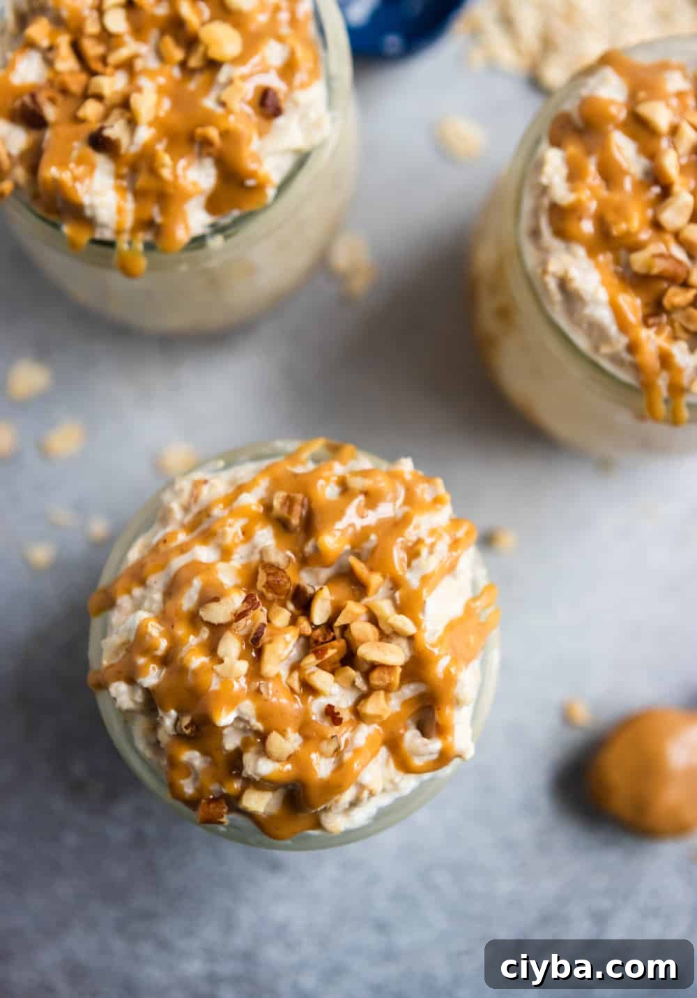 Overhead shot of peanut butter oatmeal with peanut butter drizzled over top.