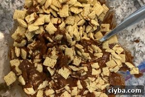 stir rice chex cereal into chocolate peanut butter mixture