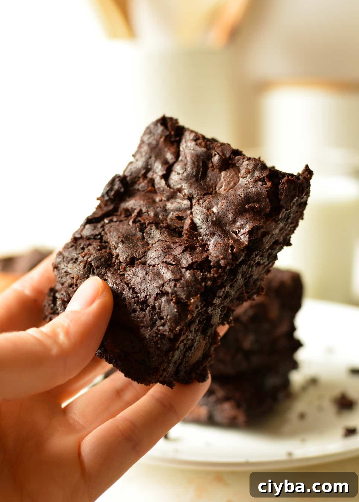 hand holding a gluten free brownie