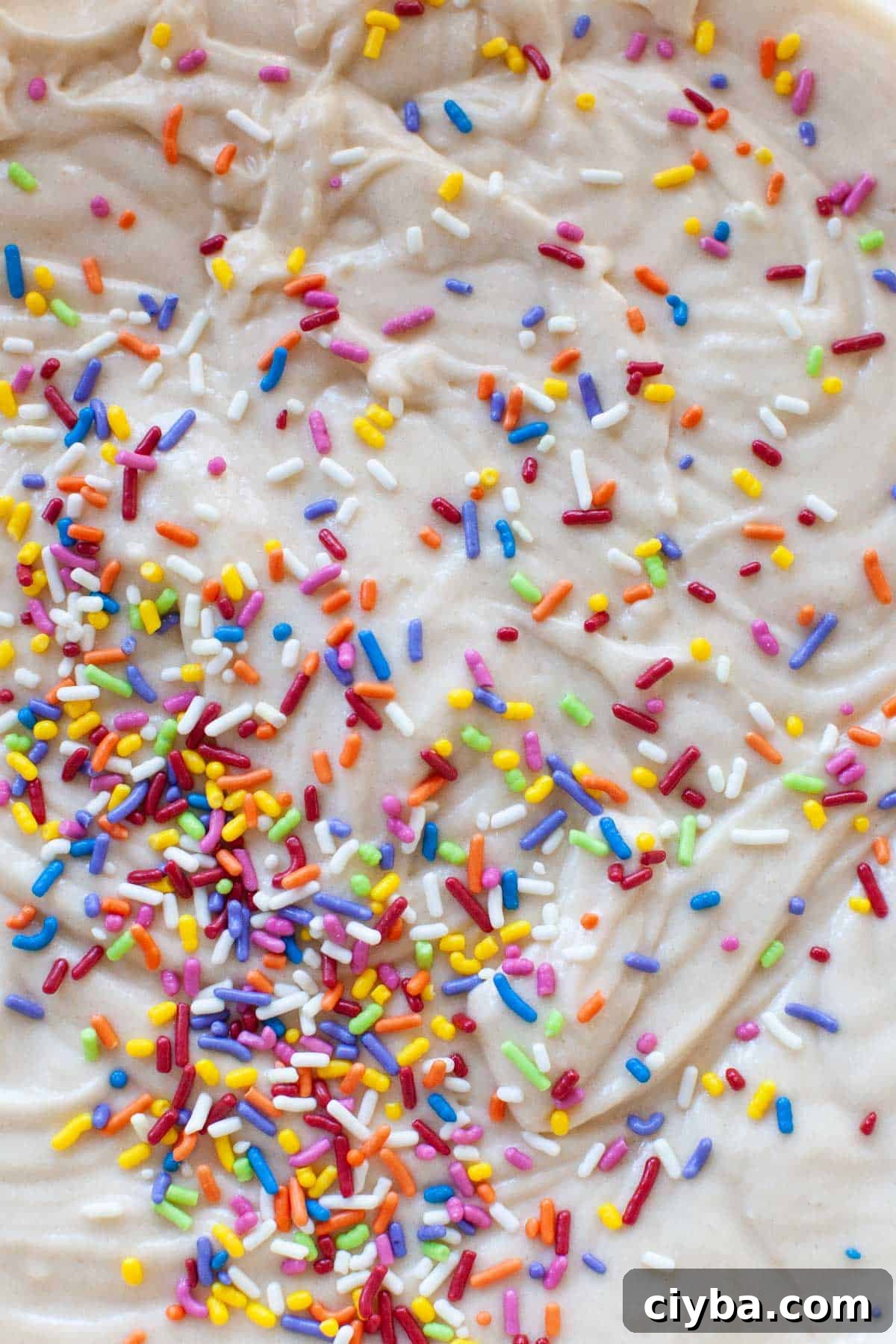 cupcake batter with sprinkles added.