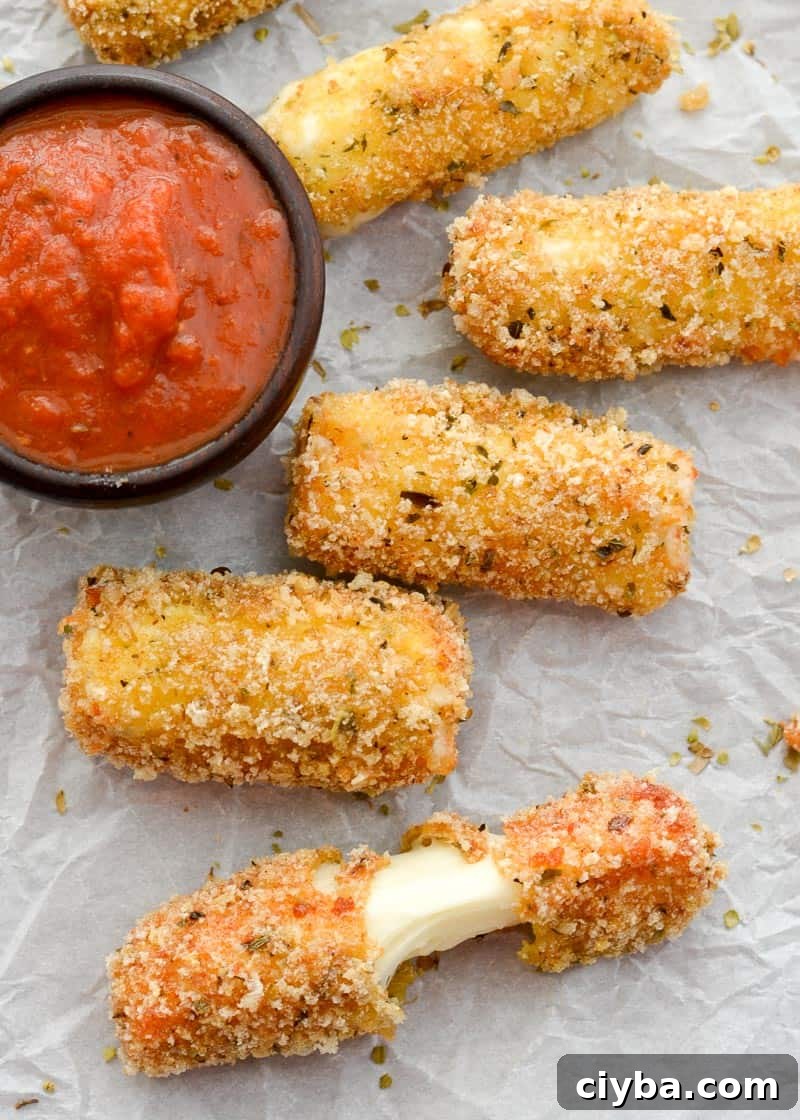 These crispy Air Fryer Keto Mozzarella Sticks are just under 2 net carbs per serving!