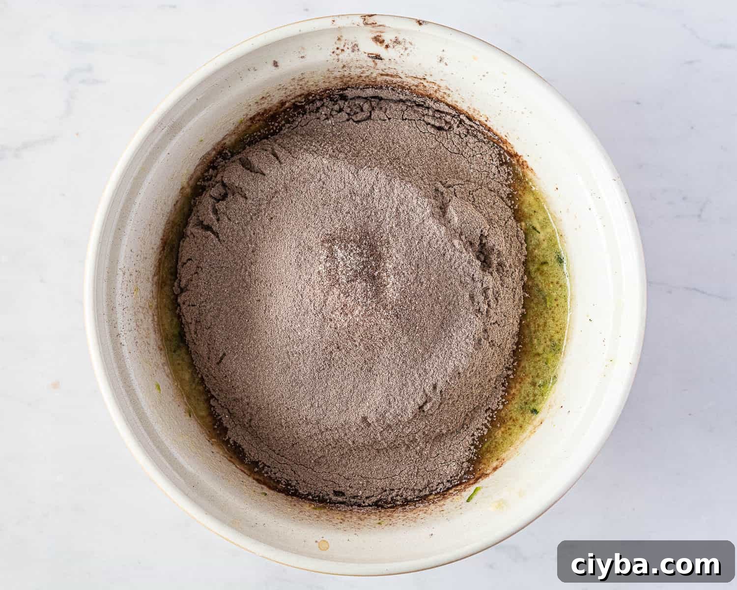 Step 2, adding the dry ingredients.