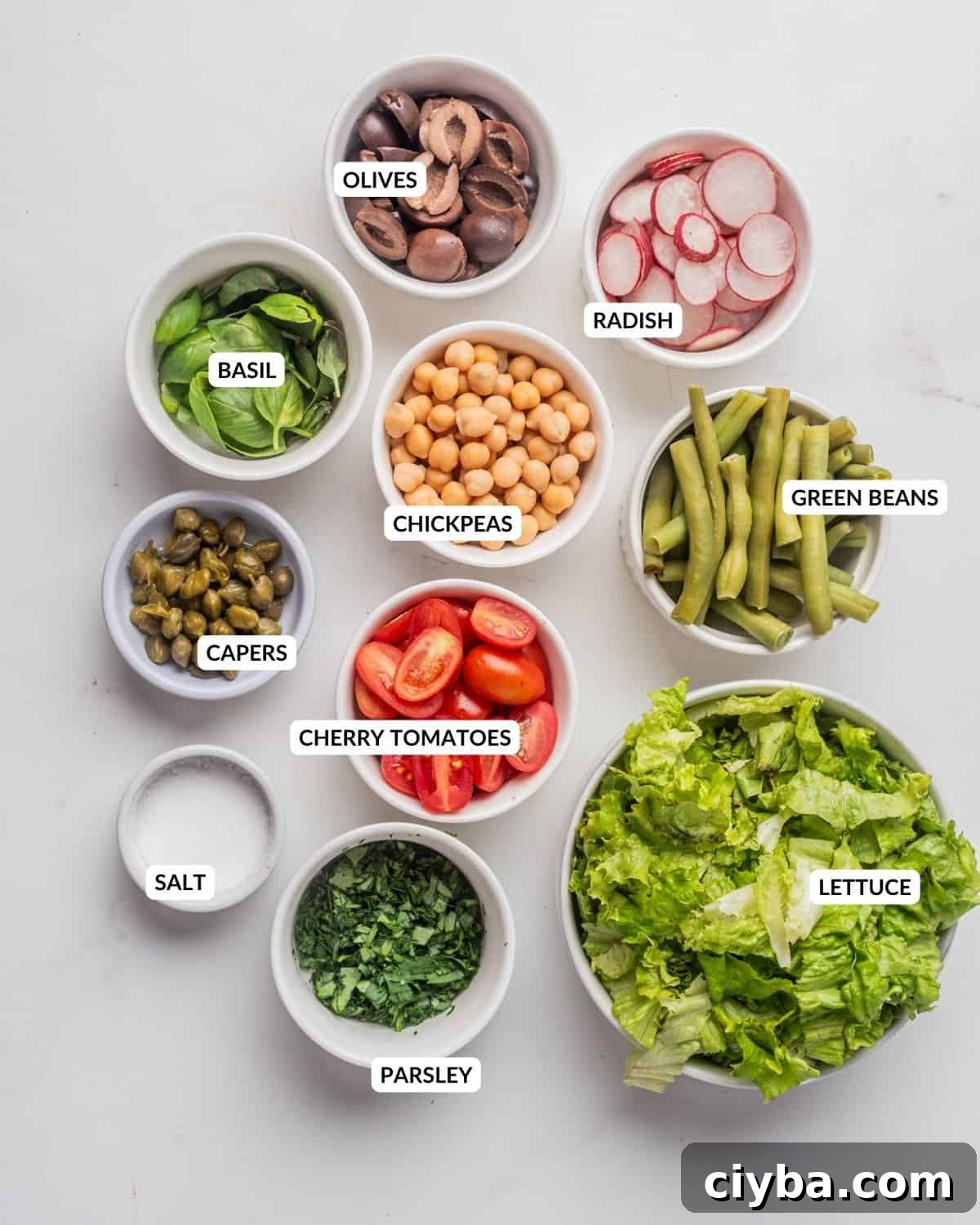 Vegan Niçoise Salad Recipe with Crispy Tofu and Olives 3 An image of the ingredients of vegan nicoise salad.