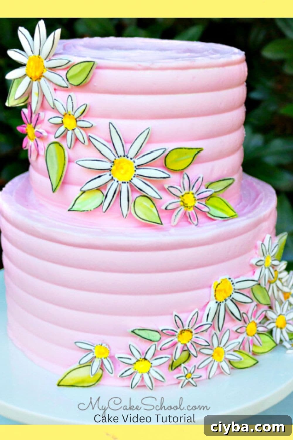 Painted Daisy Cake on pink buttercream tiers