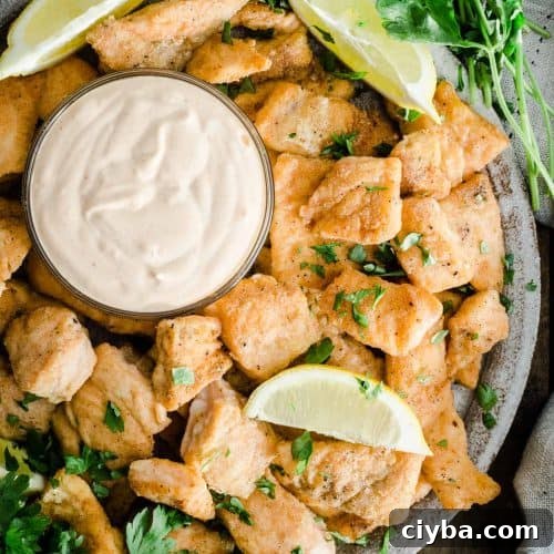 Salmon Nuggets on a plate with dipping sauce