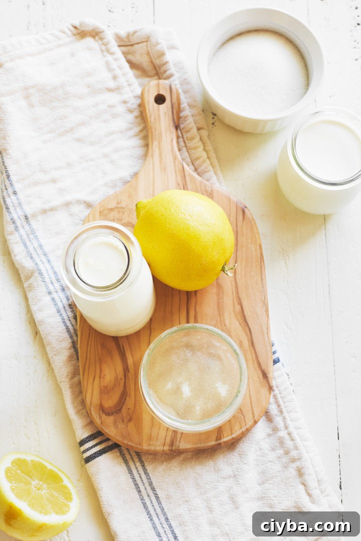 ingredients to make lemon panna cotta arranged on a cutting board