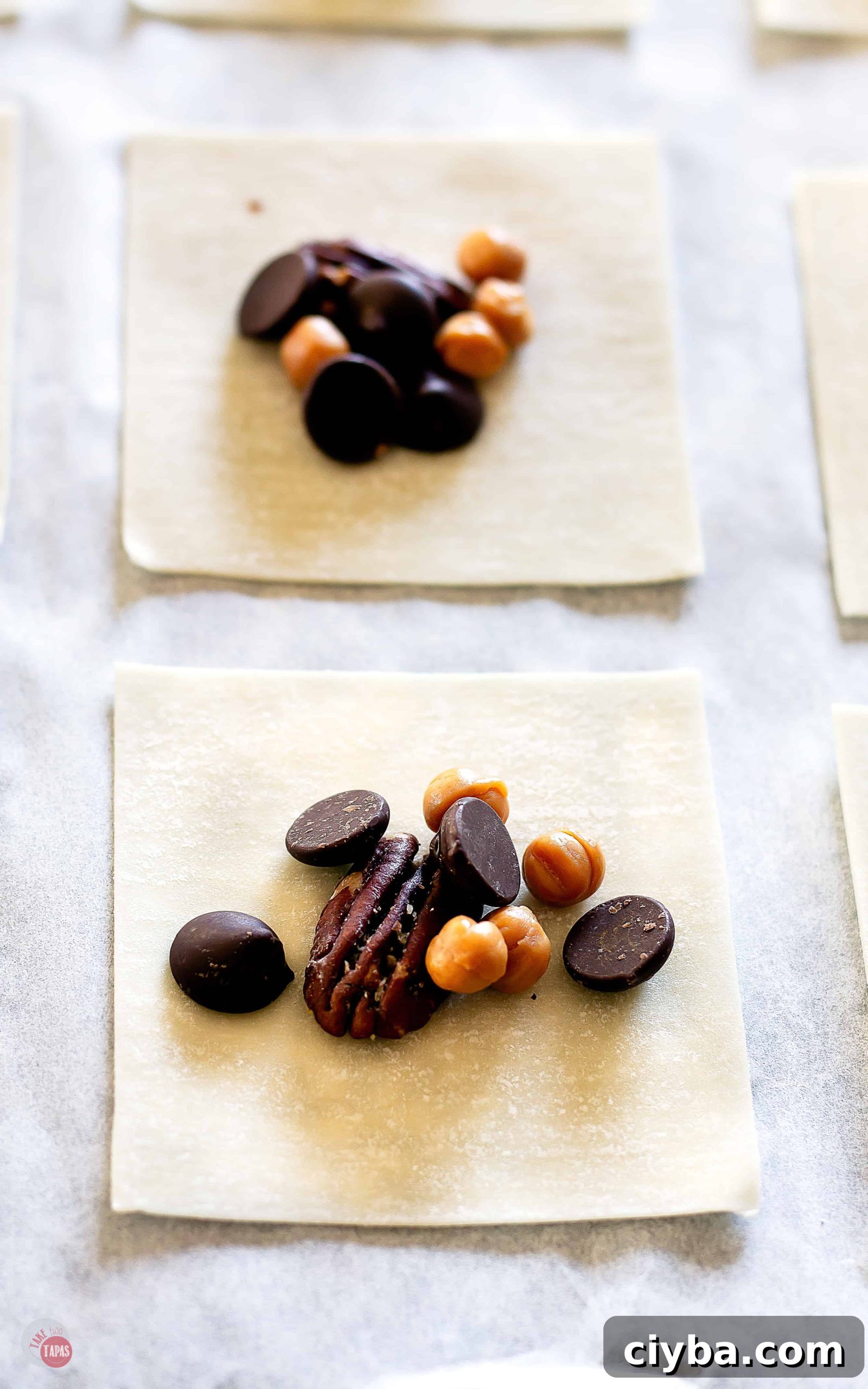 Turtle Wonton Kisses: Chocolate-Peanut Butter Candy Recipe 5 Wonton wrapper open with filling inside