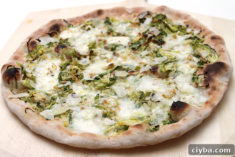 Shaved Brussels sprout pizza with burrata and dried lemon zest