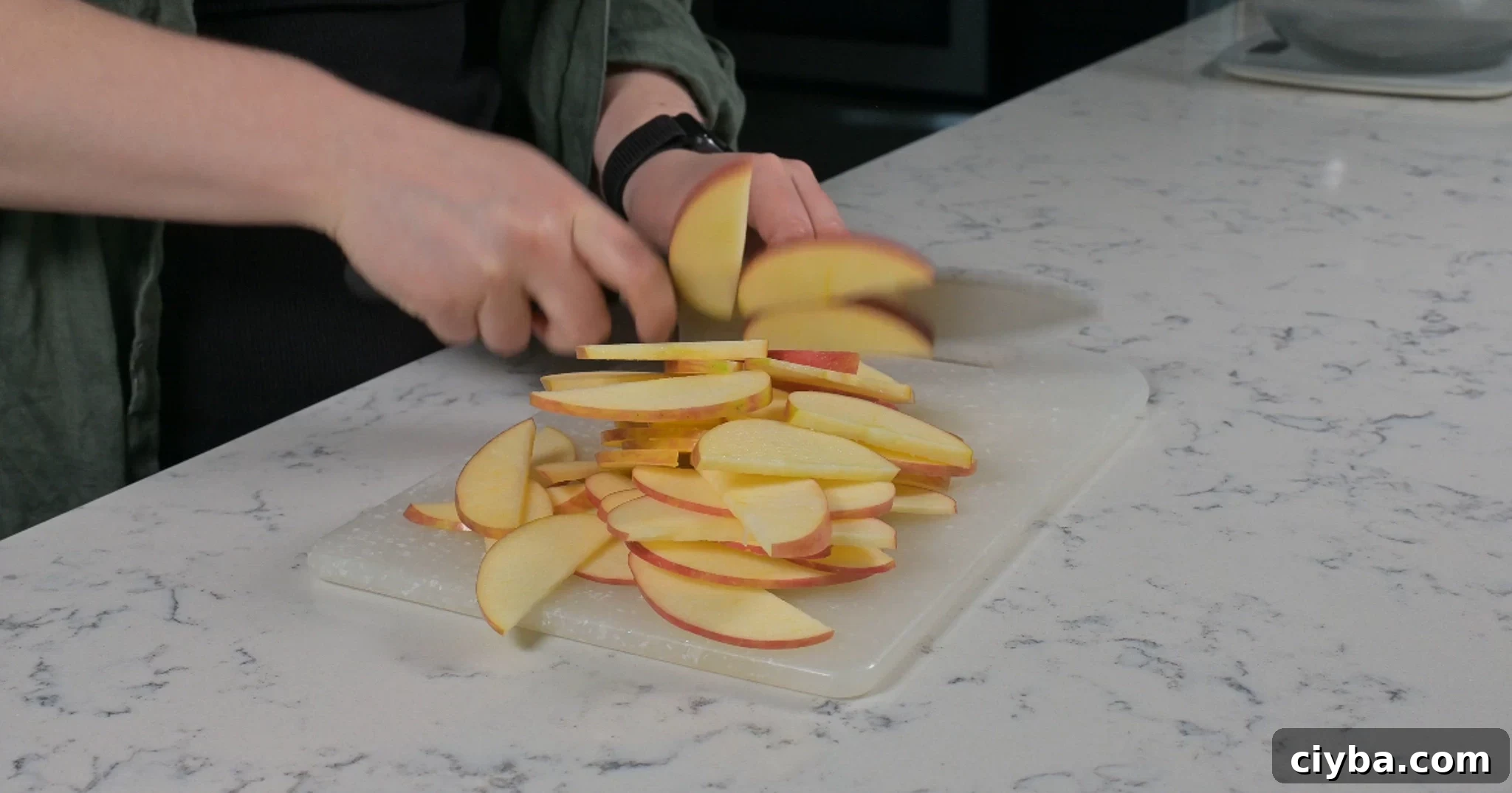 Slicing apples for decoration.