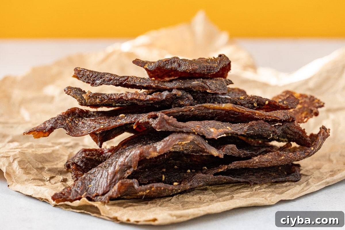 Beef jerky on parchment paper.