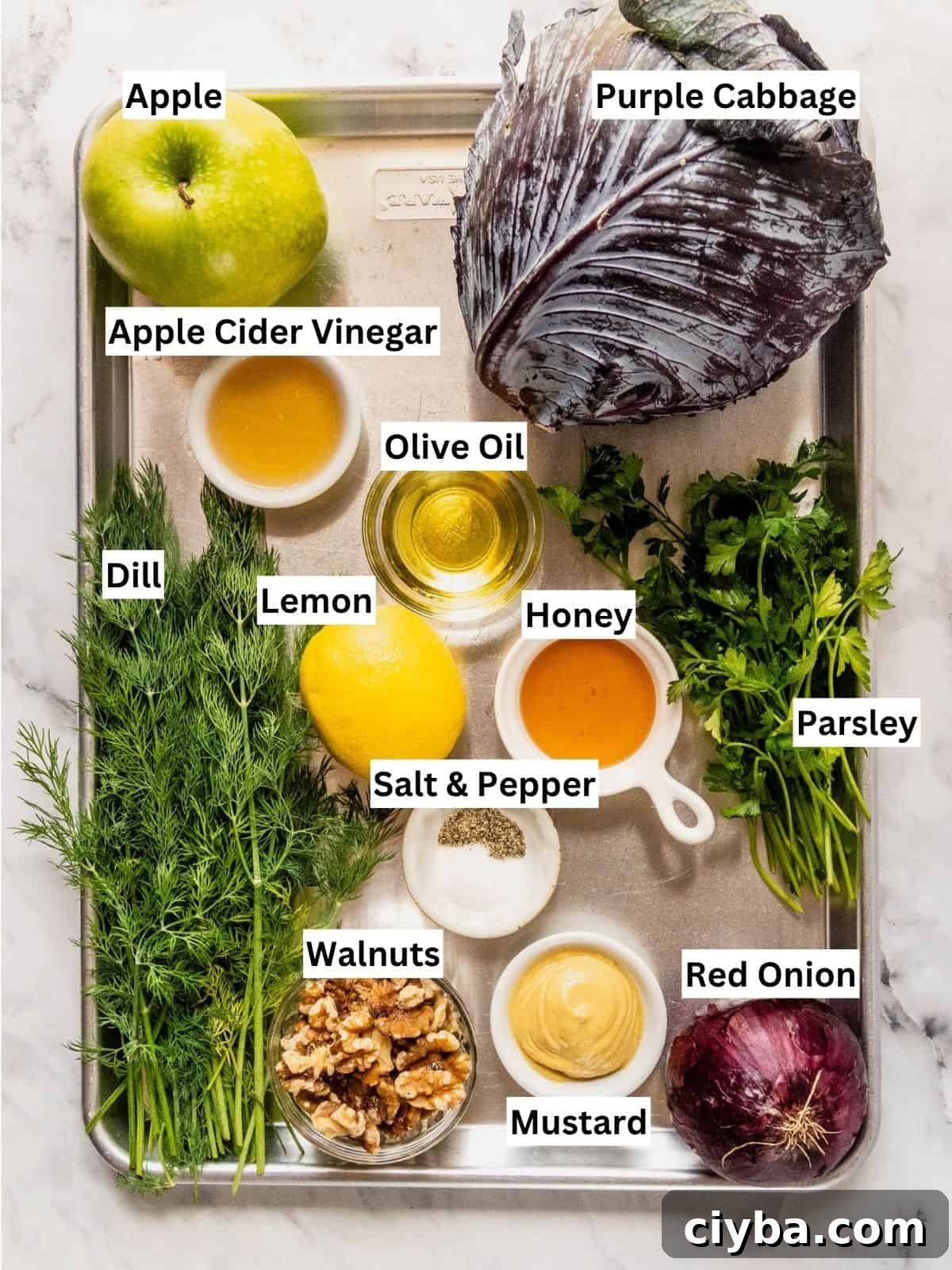 Crisp Purple Cabbage Slaw with Apple and Walnut Crunch 4 Purple Cabbage Slaw recipe ingredients with individual labels on a metal tray.