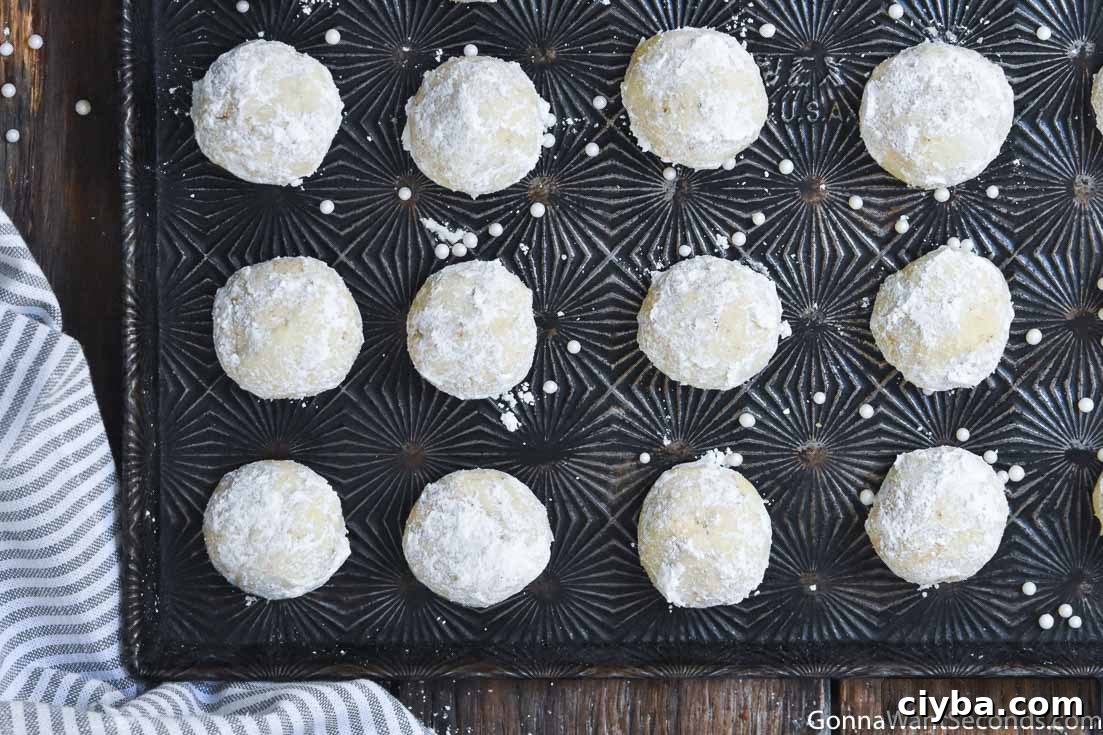 Italian Wedding Cookies on a baking sheet