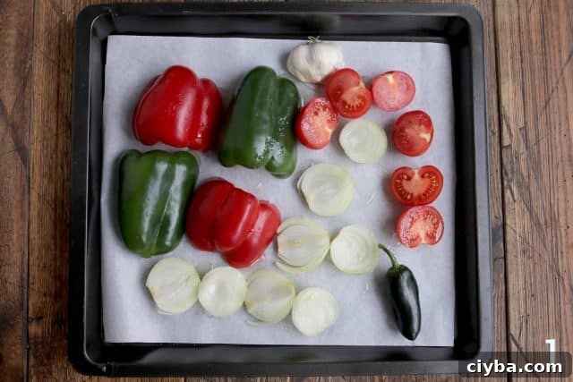 Chipotle-Style Sofritas Recipe: Spicy Tofu Bowl in 30 Minutes 6 Vegetables for sofritas sauce on a baking dish.