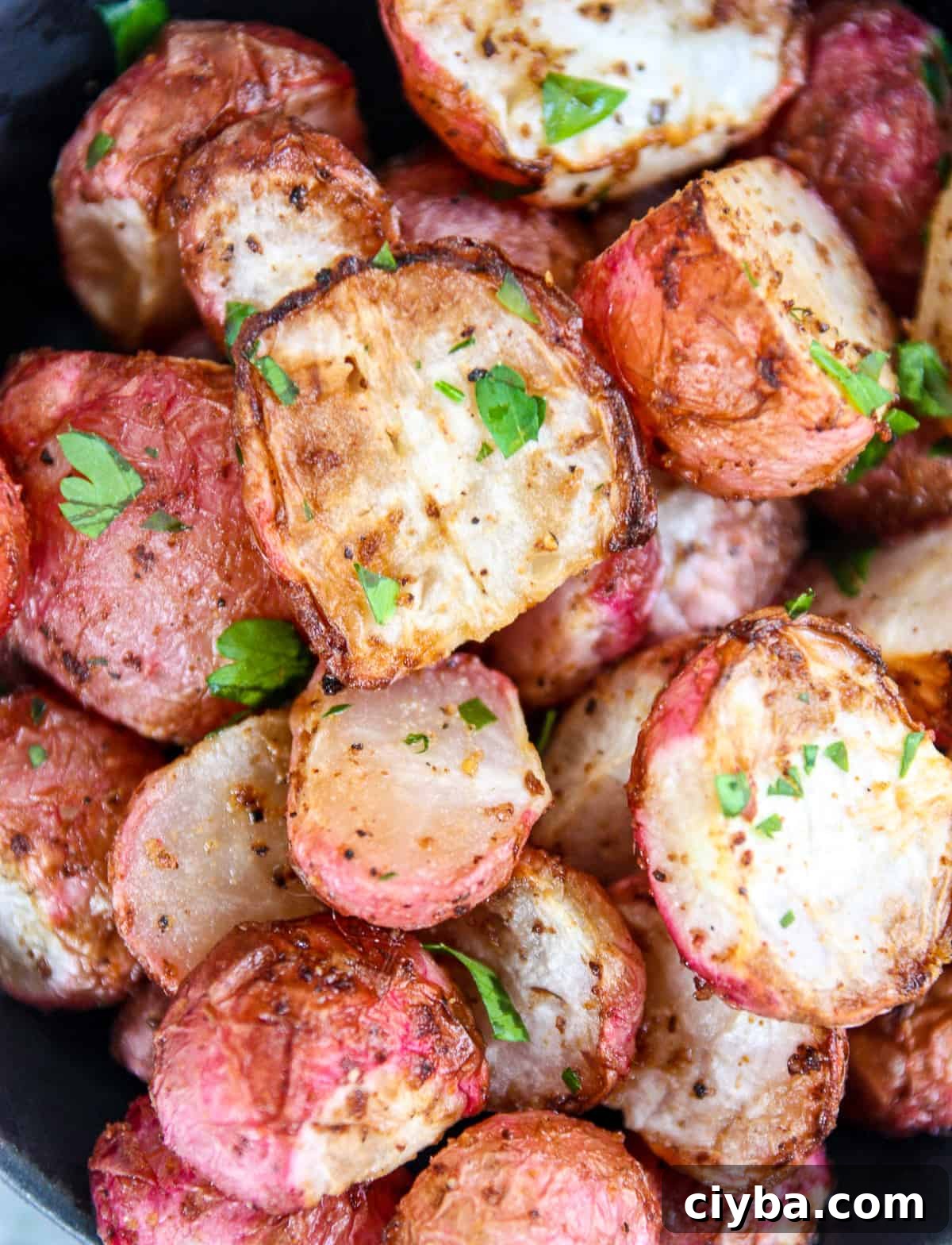 Air fried radishes garnished with parsley.