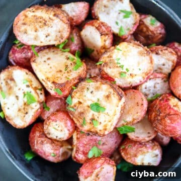 Air fried radishes in a black dish.