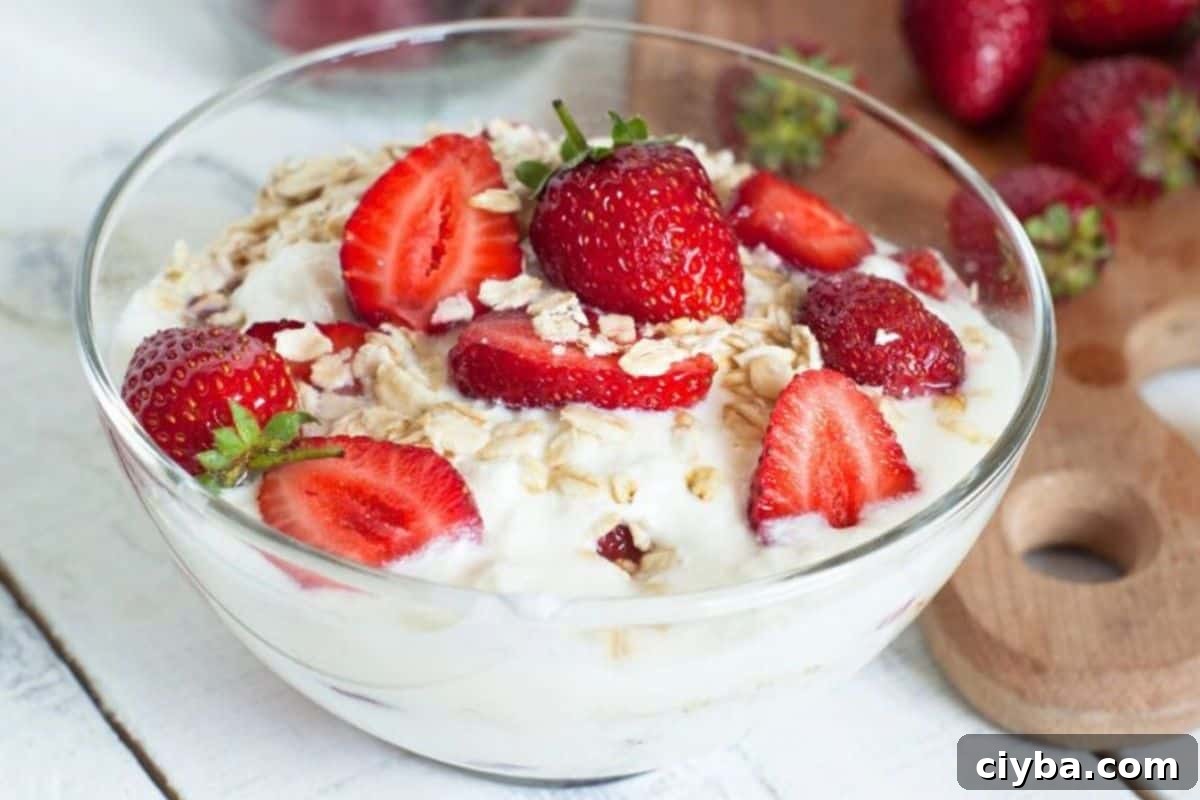 bowl of greek yogurt and strawberries