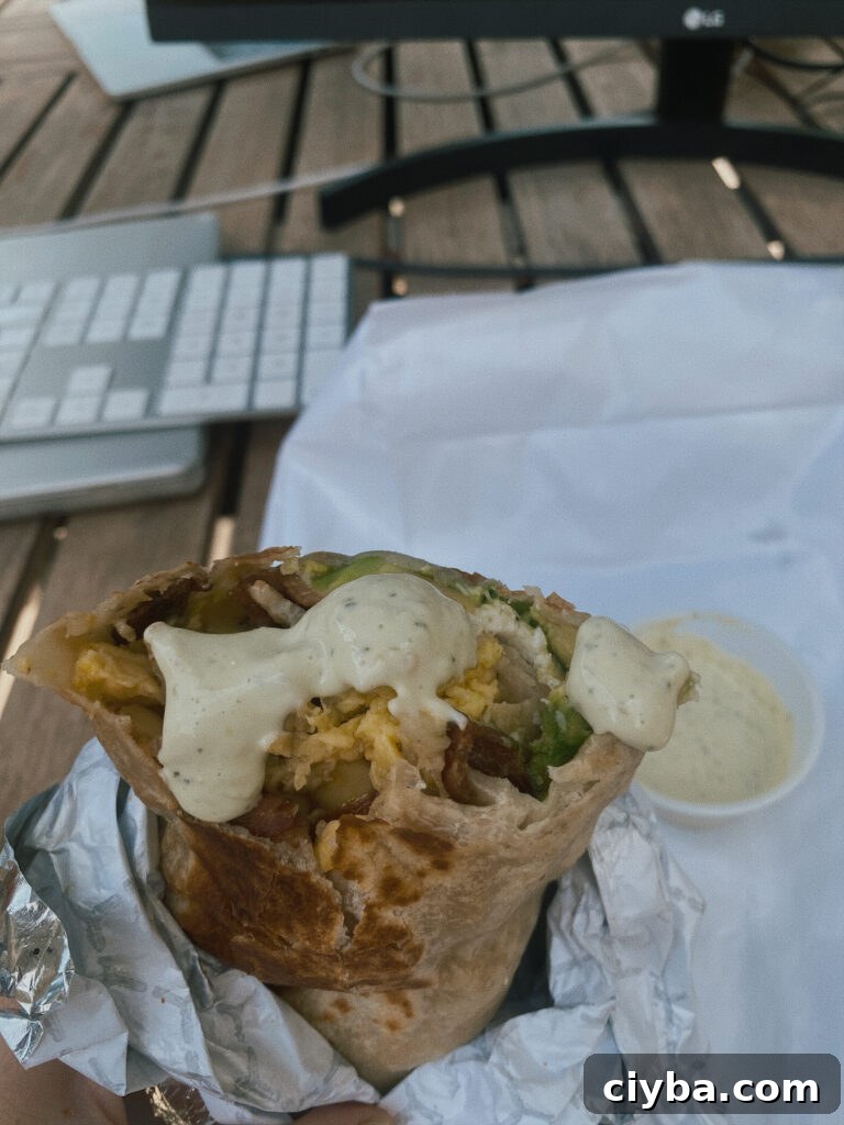 Breakfast  burrito with sauce 
