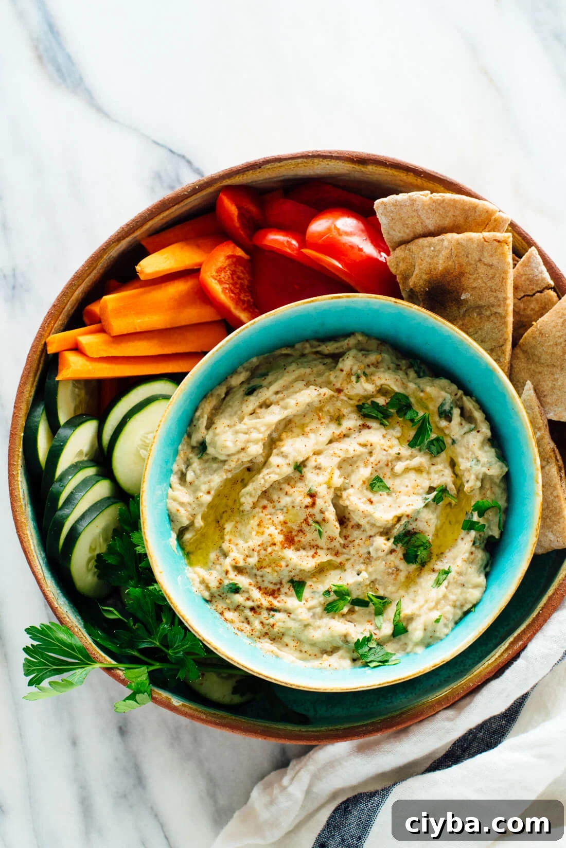 Smoky Baba Ganoush Recipe: Authentic Middle Eastern Eggplant Dip 6 This easy baba ganoush recipe tastes amazing!