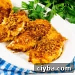 Crispy Parmesan-Crusted Chicken in the Air Fryer 5 Air Fryer Parmesan Crusted Chicken on a serving platter.