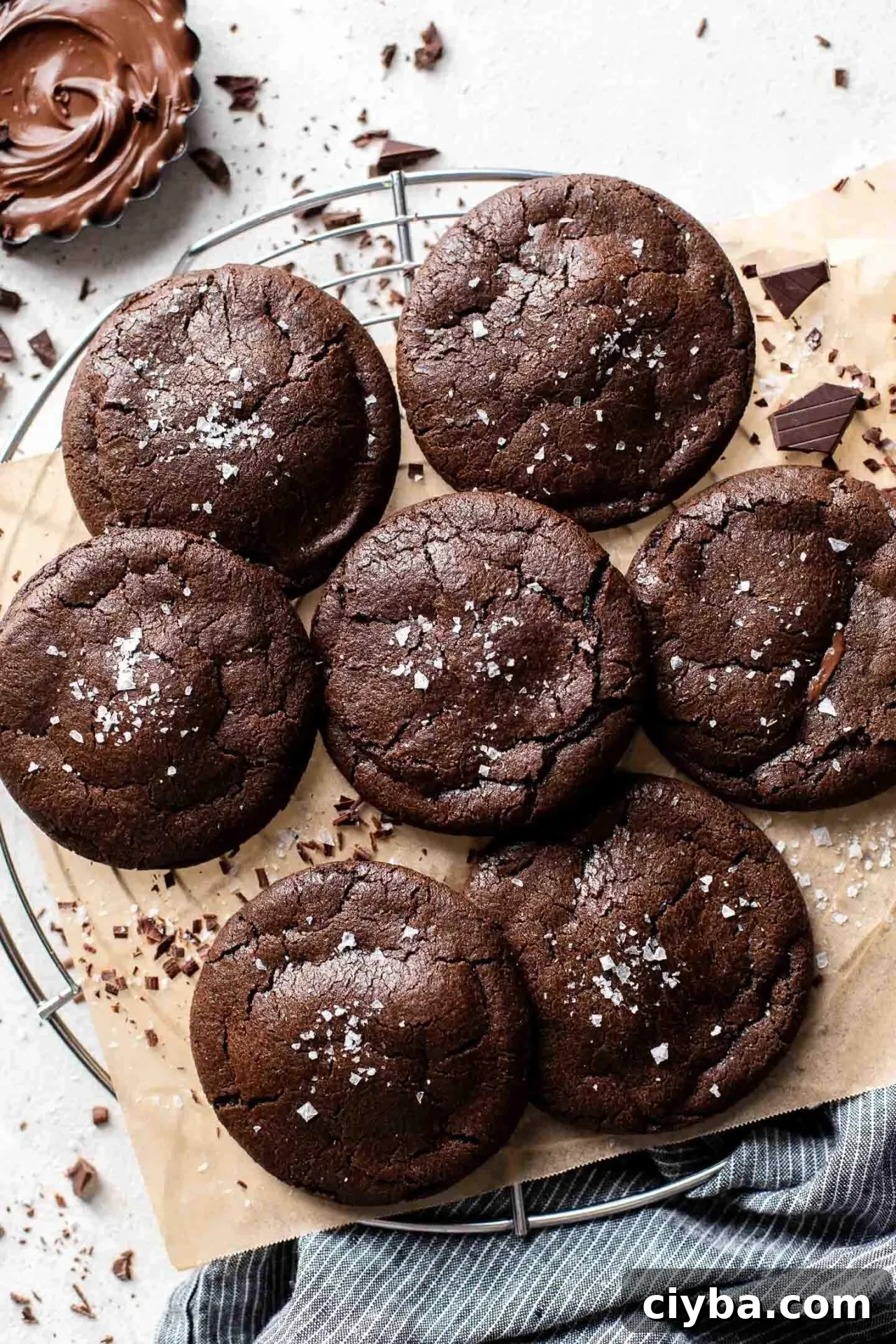 Nutella chocolate lava cookies on parchment lined wire rack