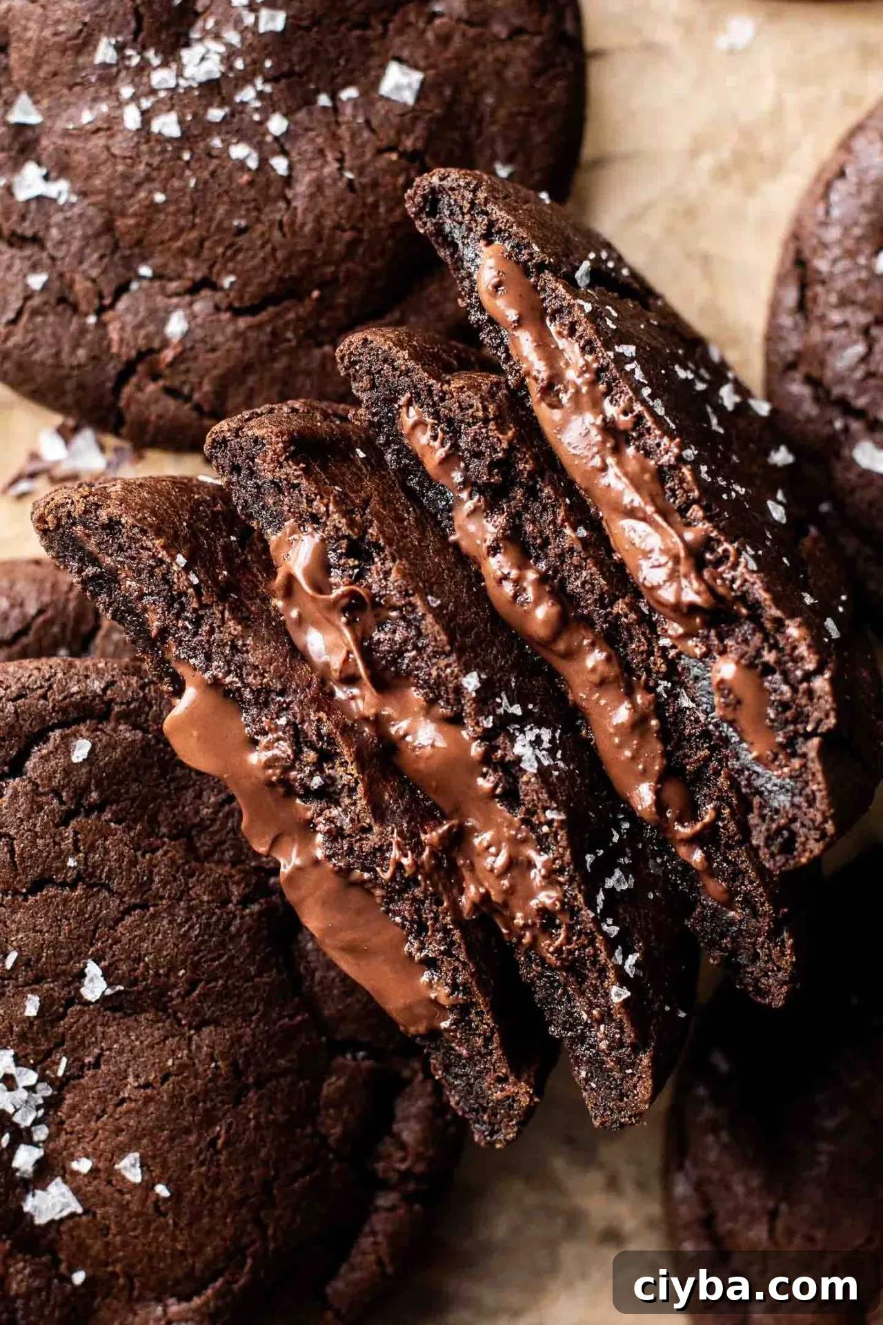 4 stacked Nutella chocolate lava cookies on parchment lined wire rack