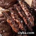 4 stacked Nutella chocolate lava cookies on parchment lined wire rack