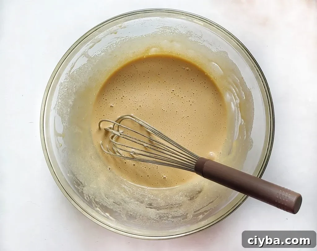 the eggs and sugar for the brownie cookies