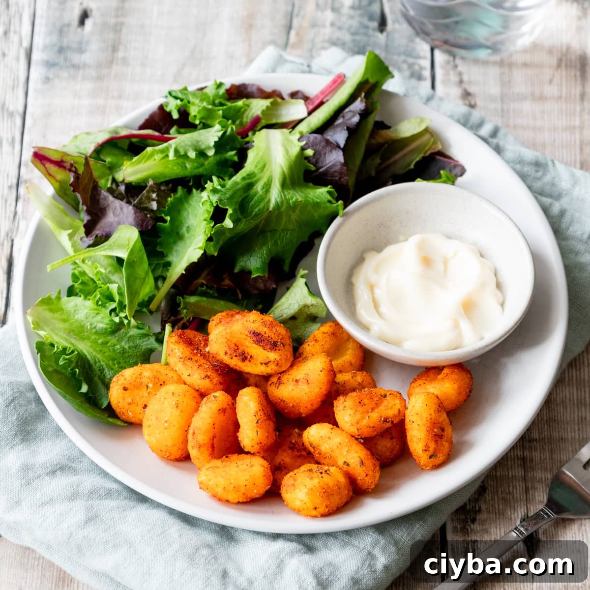 Air fried gnocchi with salad and mayonnaise