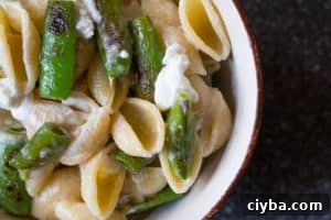 sugar snap pea and goat cheese pasta in a bowl