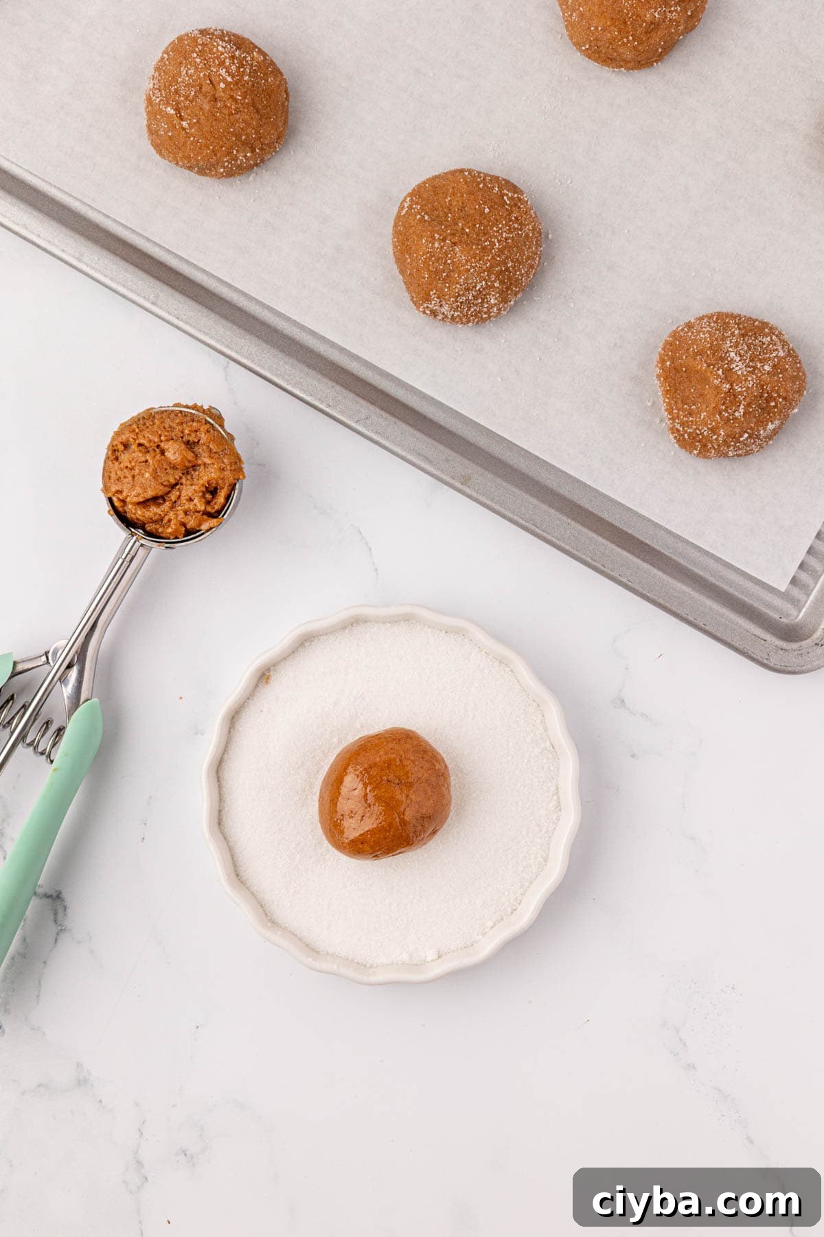 cookie dough ball dipped into sugar