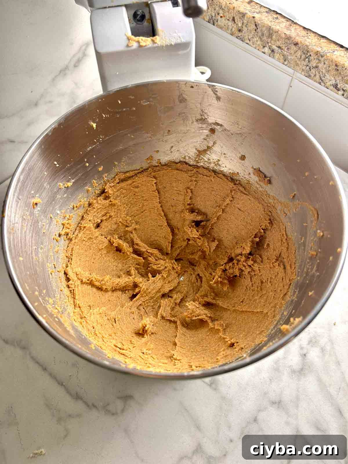 Classic Gingerbread Cookies Recipe for Soft, Spiced Cookies 4 creamed butter and sugar in mixer bowl.